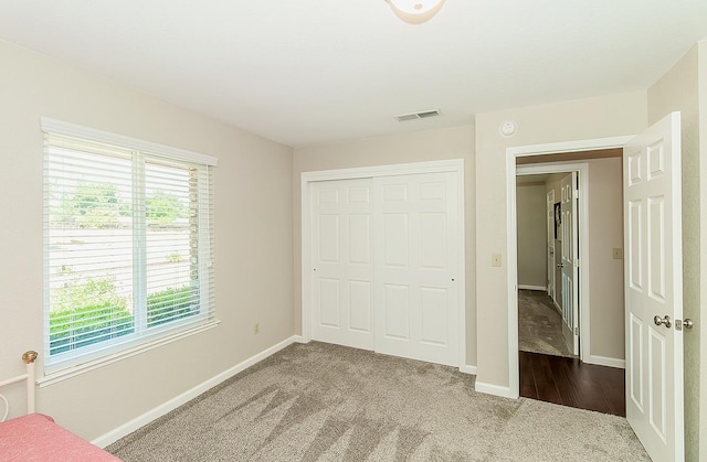 11851 Waverly Rd, Madera, CA 93636 - unfurnished bedroom featuring carpet and a closet