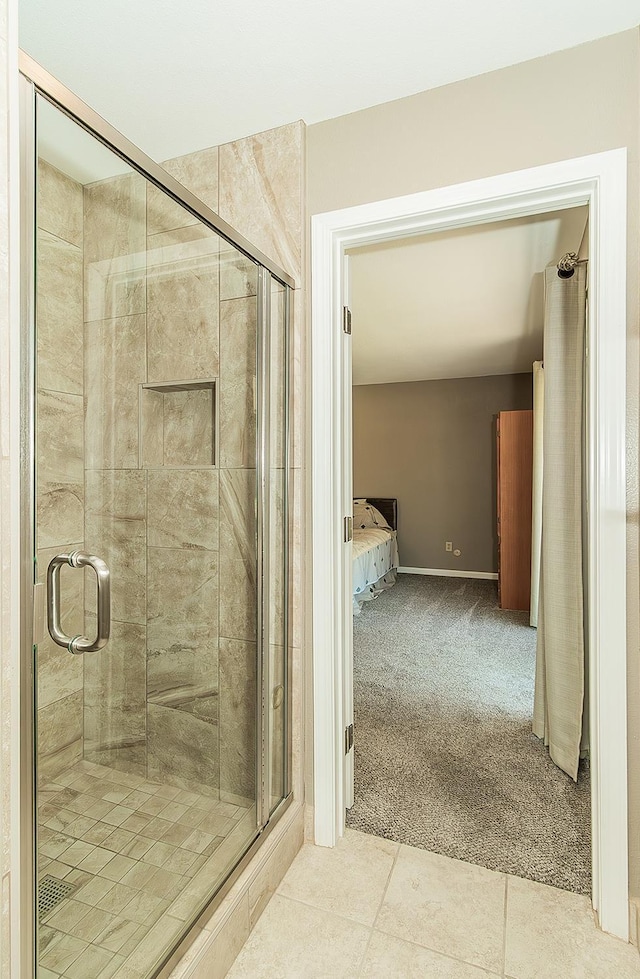 11851 Waverly Rd, Madera, CA 93636 - bathroom with a stall shower, ensuite bathroom, and tile patterned floors