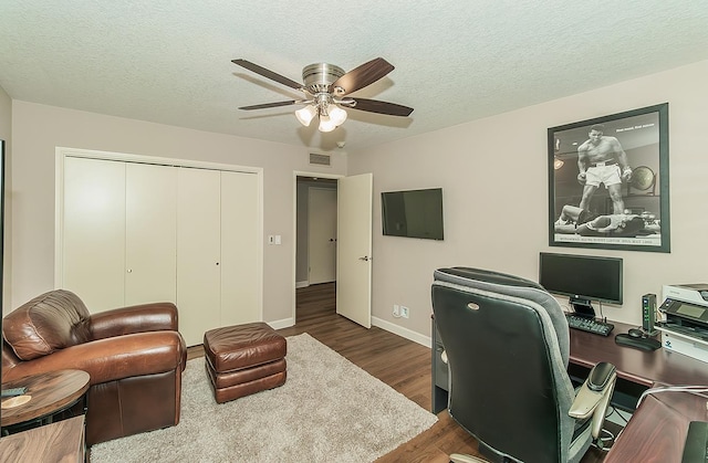 5383 N Briarwood Ave, Fresno, CA 93711 - office with a ceiling fan, dark wood-style flooring, and a textured ceiling