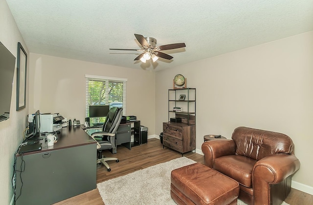 5383 N Briarwood Ave, Fresno, CA 93711 - home office with a ceiling fan, wood finished floors, and a textured ceiling