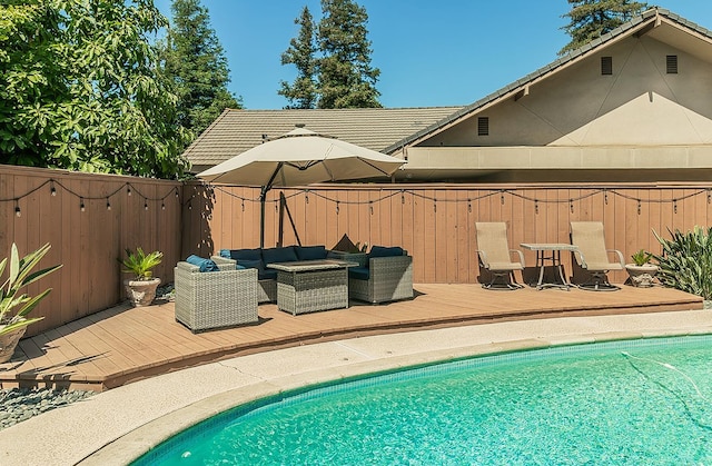 5383 N Briarwood Ave, Fresno, CA 93711 - view of swimming pool featuring a deck and an outdoor living space