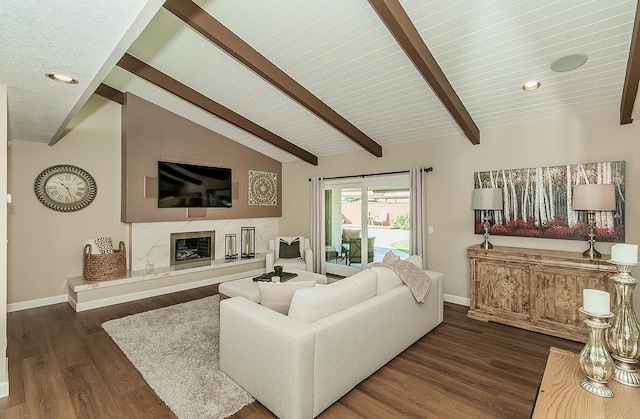 5383 N Briarwood Ave, Fresno, CA 93711 - living room with a high end fireplace, dark wood finished floors, and recessed lighting