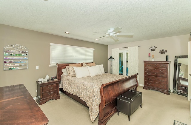 5383 N Briarwood Ave, Fresno, CA 93711 - bedroom featuring light carpet, ceiling fan, and a textured ceiling
