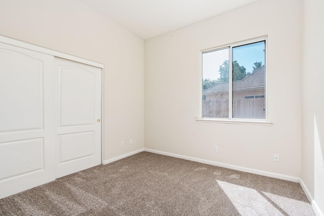 9416 N Jade Ave, Fresno, CA 93720 - unfurnished bedroom featuring carpet and a closet