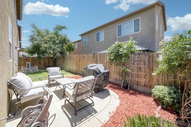 7345 E Giavanna Ave, Fresno, CA 93737 - fenced backyard featuring area for grilling, an outdoor hangout area, and a patio