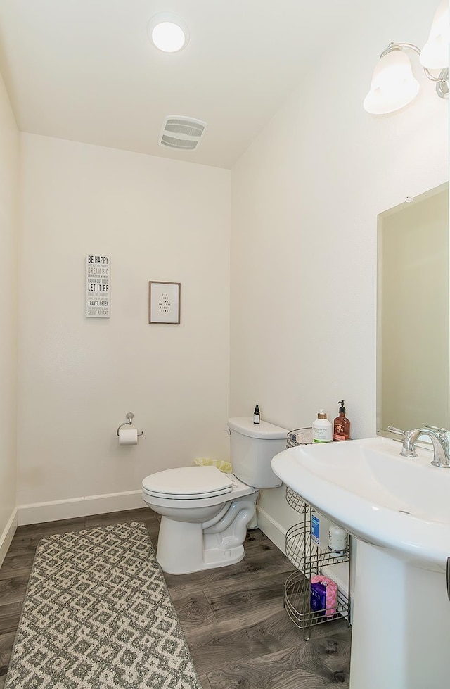 463 Mesa Dr S, Madera, CA 93636 - half bathroom with wood finished floors