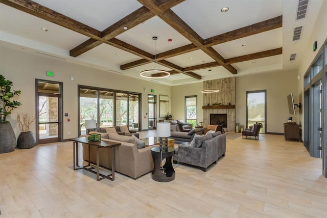 463 Mesa Dr S, Madera, CA 93636 - living area with coffered ceiling, beamed ceiling, and a large fireplace