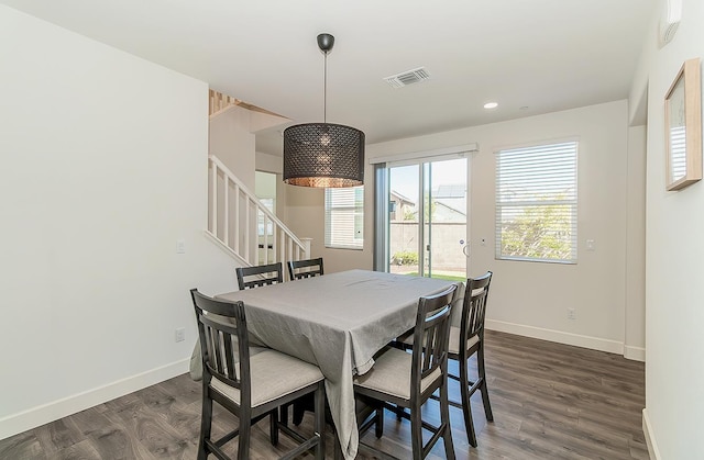 463 Mesa Dr S, Madera, CA 93636 - dining area featuring healthy amount of natural light, dark wood finished floors, stairway, and recessed lighting