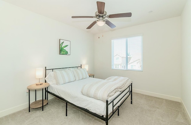 463 Mesa Dr S, Madera, CA 93636 - bedroom with light colored carpet and a ceiling fan