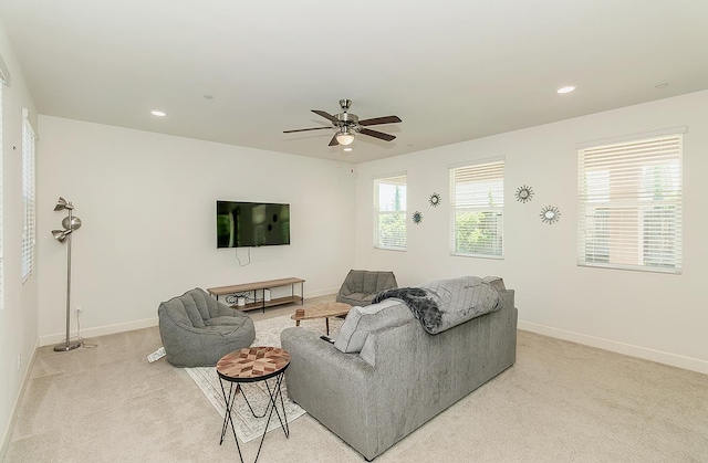 463 Mesa Dr S, Madera, CA 93636 - living area featuring light carpet, ceiling fan, and recessed lighting