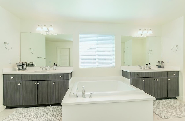 463 Mesa Dr S, Madera, CA 93636 - bathroom featuring a garden tub and two vanities