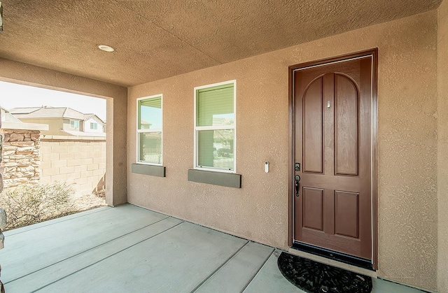 463 Mesa Dr S, Madera, CA 93636 - property entrance featuring stucco siding and a patio
