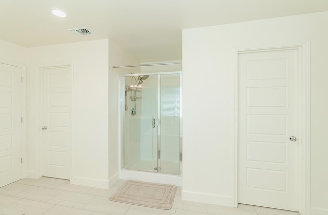 463 Mesa Dr S, Madera, CA 93636 - bathroom featuring a shower stall, tile patterned floors, and recessed lighting