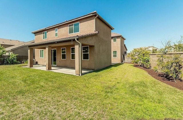 463 Mesa Dr S, Madera, CA 93636 - rear view of property featuring a patio, stucco siding, and a fenced backyard