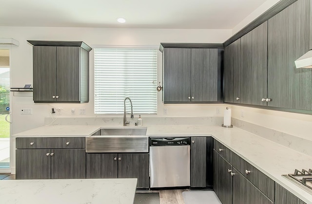 463 Mesa Dr S, Madera, CA 93636 - kitchen featuring dishwasher, light wood-type flooring, and light stone counters