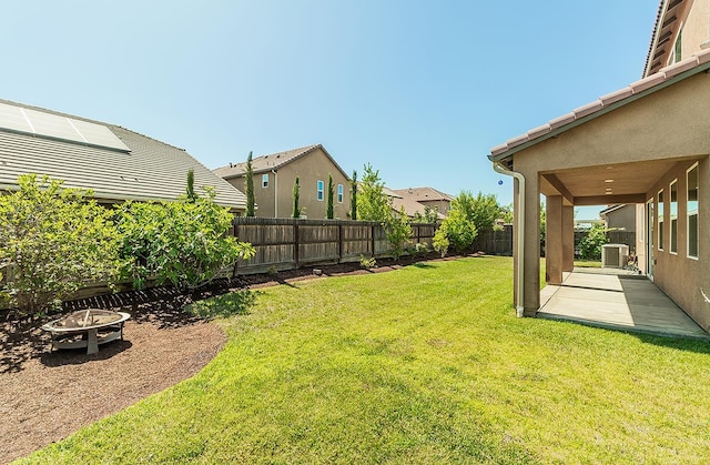 463 Mesa Dr S, Madera, CA 93636 - fenced backyard featuring an outdoor fire pit and a patio