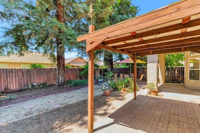 5613 W Bluff Ave, Fresno, CA 93722 - fenced backyard with a patio area