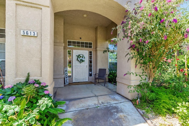 5613 W Bluff Ave, Fresno, CA 93722 - property entrance featuring stucco siding