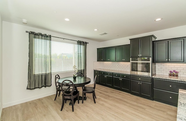 117 Emperor Way, Dinuba, CA 93618 - dining room with light wood finished floors and recessed lighting