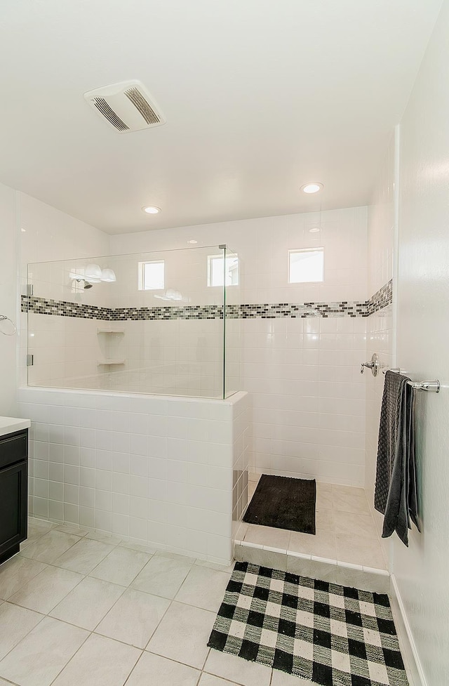 117 Emperor Way, Dinuba, CA 93618 - full bath with tile patterned flooring, a walk in shower, vanity, and recessed lighting