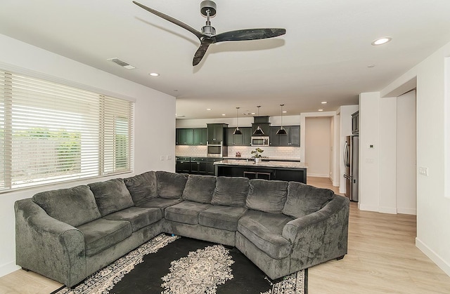 117 Emperor Way, Dinuba, CA 93618 - living area featuring light wood-type flooring, recessed lighting, and ceiling fan