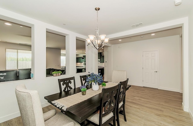 117 Emperor Way, Dinuba, CA 93618 - dining area with a chandelier, recessed lighting, and light wood-style floors