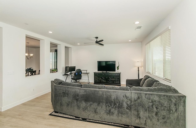 117 Emperor Way, Dinuba, CA 93618 - living area featuring wood finished floors, recessed lighting, a chandelier, and a ceiling fan