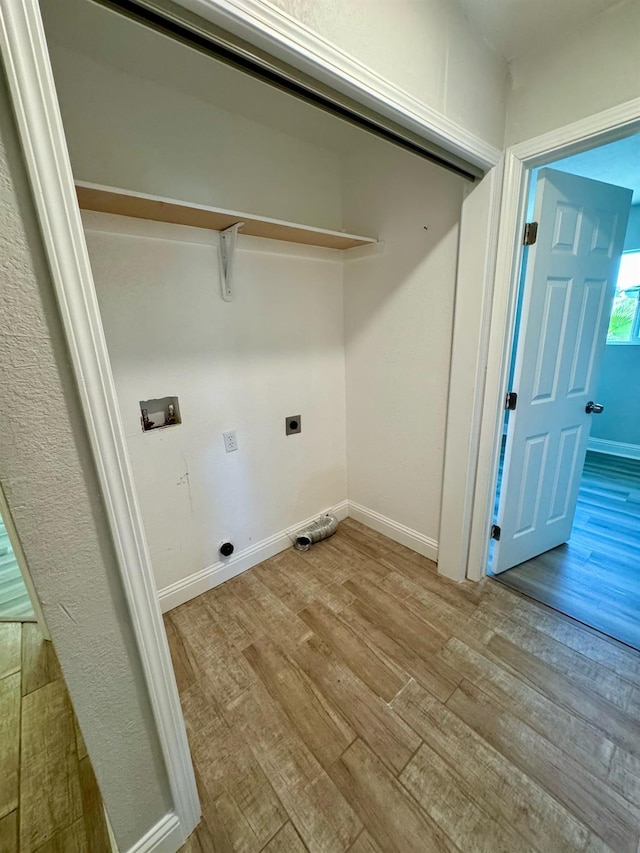 195 Hoover St, Coalinga, CA 93210 - washroom with wood finished floors, washer hookup, electric dryer hookup, and hookup for a gas dryer