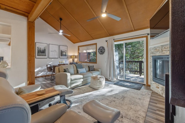 40607 Mill Run Ln Unit 72, Shaver Lake, CA 93664 - living area with ceiling fan, wood finished floors, wood ceiling, and a fireplace