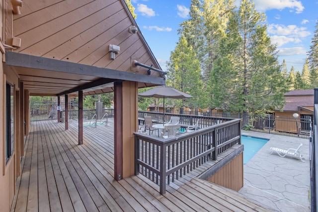 40607 Mill Run Ln Unit 72, Shaver Lake, CA 93664 - deck with a fenced backyard and a community pool