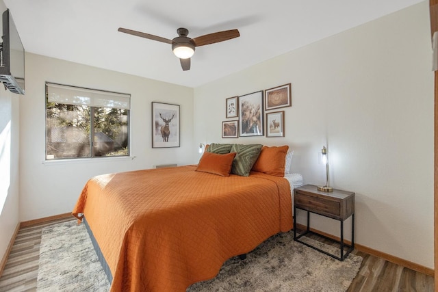 40607 Mill Run Ln Unit 72, Shaver Lake, CA 93664 - bedroom featuring wood finished floors and a ceiling fan