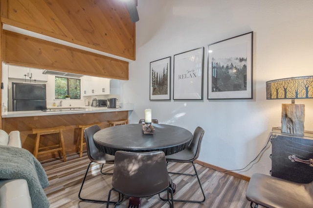 40607 Mill Run Ln Unit 72, Shaver Lake, CA 93664 - dining space with wood finished floors and baseboards