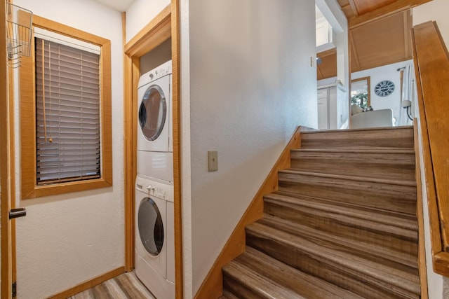 40607 Mill Run Ln Unit 72, Shaver Lake, CA 93664 - laundry room with stacked washer and clothes dryer and baseboards