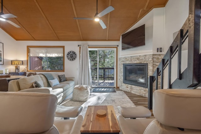 40607 Mill Run Ln Unit 72, Shaver Lake, CA 93664 - living room featuring ceiling fan, vaulted ceiling, wood finished floors, a stone fireplace, and wood ceiling