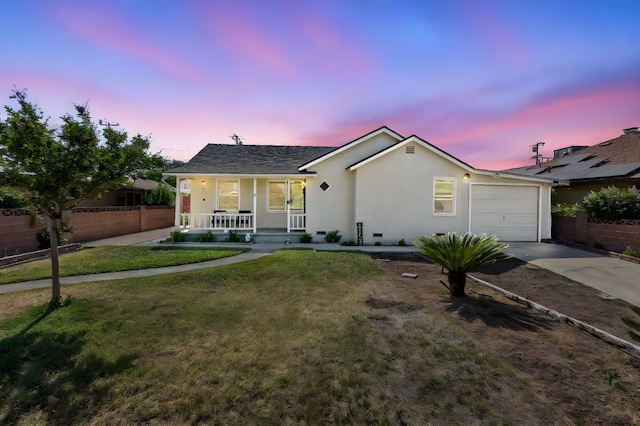 723 N Lourae Ave, Reedley, CA 93654 - ranch-style house with covered porch, an attached garage, driveway, and stucco siding