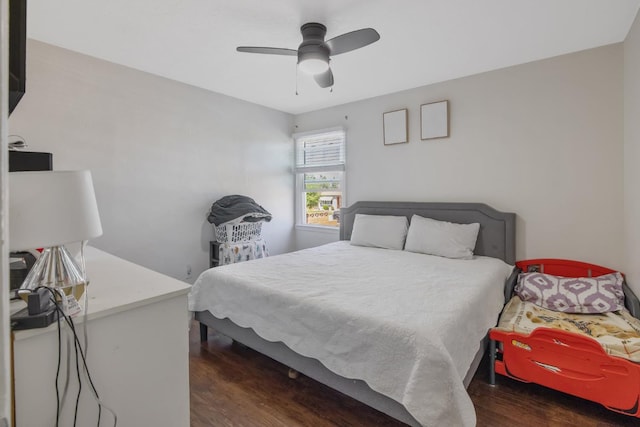723 N Lourae Ave, Reedley, CA 93654 - bedroom with wood finished floors and a ceiling fan