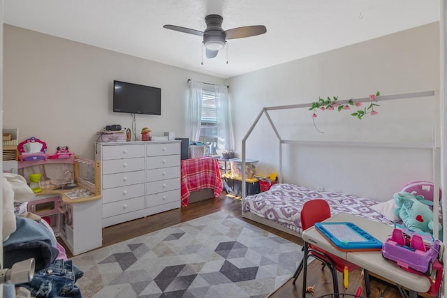 723 N Lourae Ave, Reedley, CA 93654 - bedroom featuring wood finished floors and ceiling fan