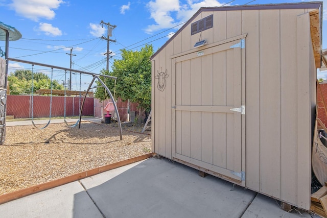 723 N Lourae Ave, Reedley, CA 93654 - view of shed featuring a playground