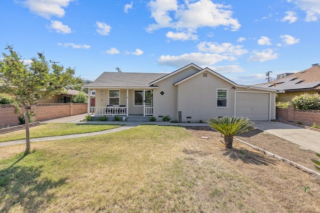 723 N Lourae Ave, Reedley, CA 93654 - ranch-style home featuring a porch, an attached garage, concrete driveway, and stucco siding