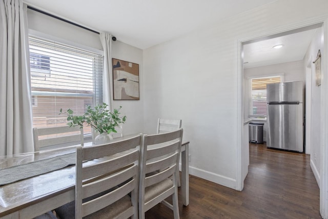 723 N Lourae Ave, Reedley, CA 93654 - dining space featuring wood finished floors and baseboards