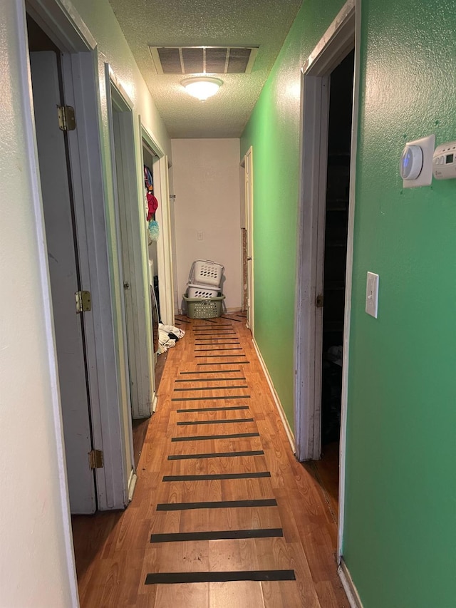 2327 S Martin L King Jr Blvd, Fresno, CA 93706 - corridor featuring wood finished floors