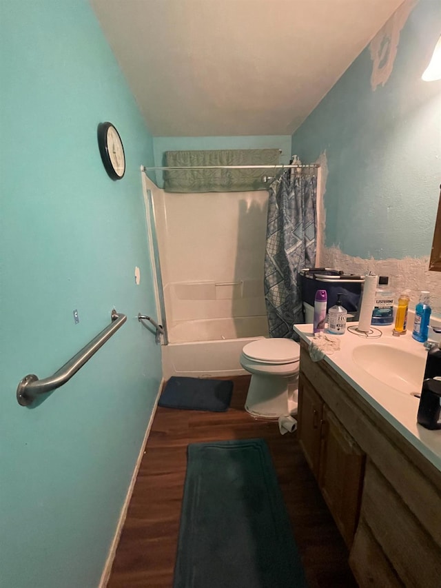2327 S Martin L King Jr Blvd, Fresno, CA 93706 - bathroom featuring wood finished floors, shower / bath combo with shower curtain, and vanity