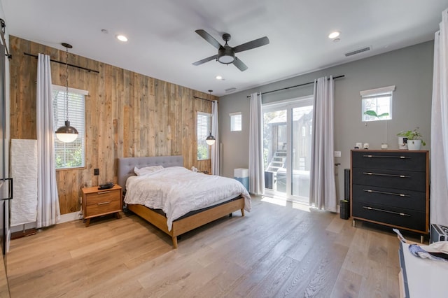 4240 Rall Ave, Clovis, CA 93619 - bedroom featuring wooden walls, access to outside, light wood-style flooring, recessed lighting, and a ceiling fan