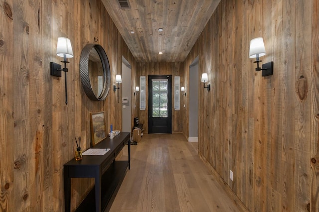 4240 Rall Ave, Clovis, CA 93619 - entrance foyer with wooden walls and light wood-style floors