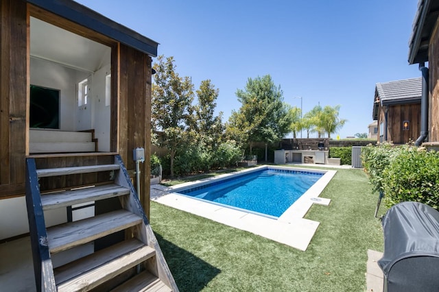 4240 Rall Ave, Clovis, CA 93619 - view of pool featuring area for grilling and a fenced backyard