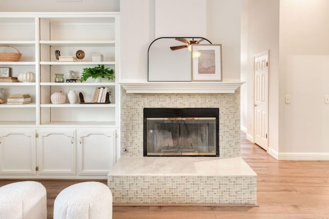 7334 N Geraldine Ave, Fresno, CA 93711 - detailed view of wood finished floors and a fireplace