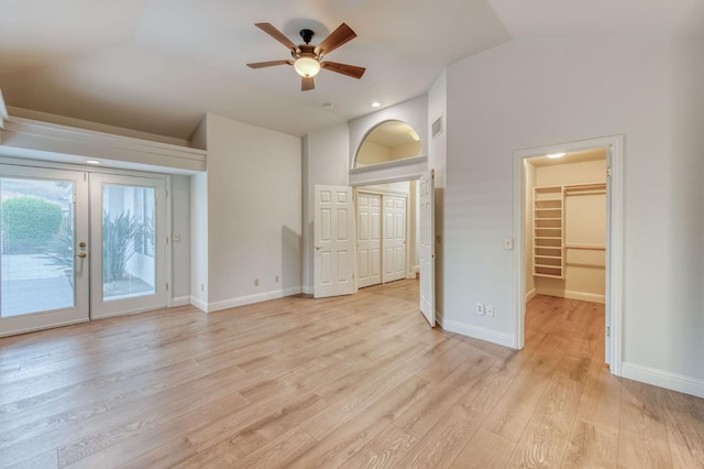 7334 N Geraldine Ave, Fresno, CA 93711 - unfurnished living room with lofted ceiling, french doors, ceiling fan, and light wood-type flooring