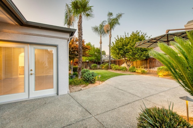 7334 N Geraldine Ave, Fresno, CA 93711 - fenced backyard featuring a patio area