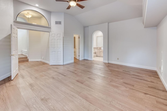 7334 N Geraldine Ave, Fresno, CA 93711 - spare room featuring ceiling fan, arched walkways, vaulted ceiling, light wood finished floors, and recessed lighting