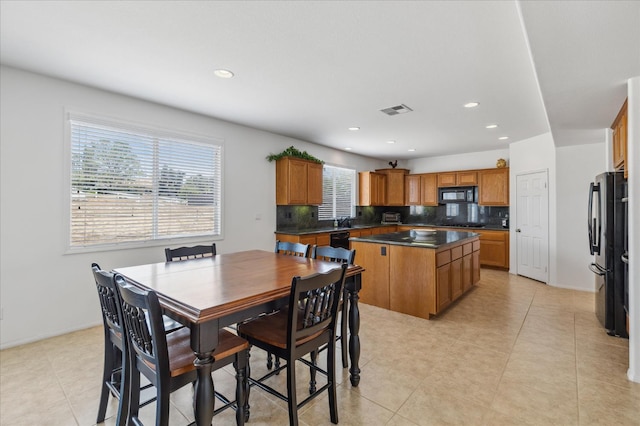 18555 Malkoha St, Riverside, CA 92570 - dining room featuring recessed lighting and light tile patterned floors
